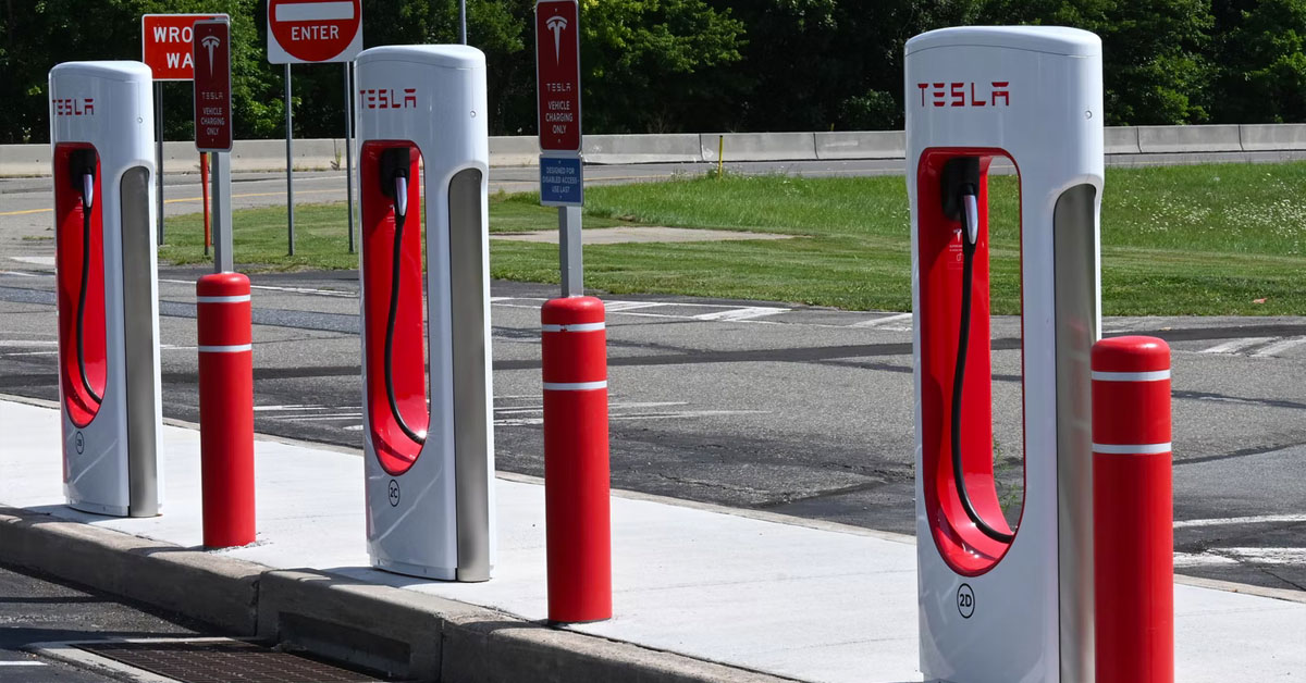 An image of a set of Tesla Supercharger at a station