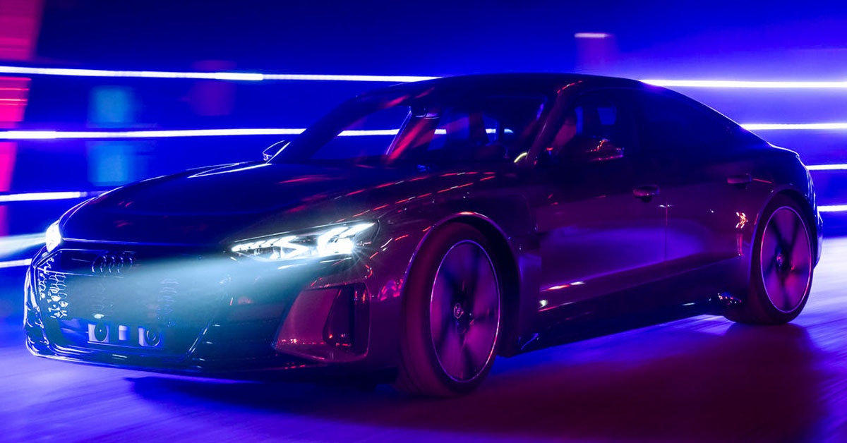 An image of the 2021 Audi e-tron GT being driven at night time