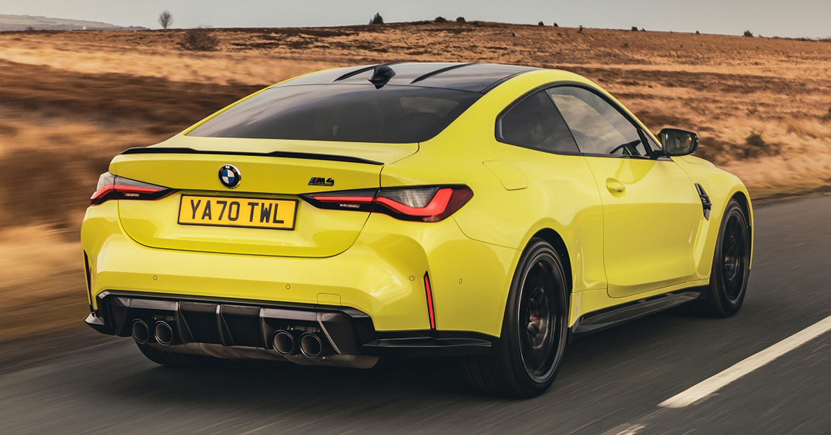An image of a 2022 BMW M4 Coupe from the rear
