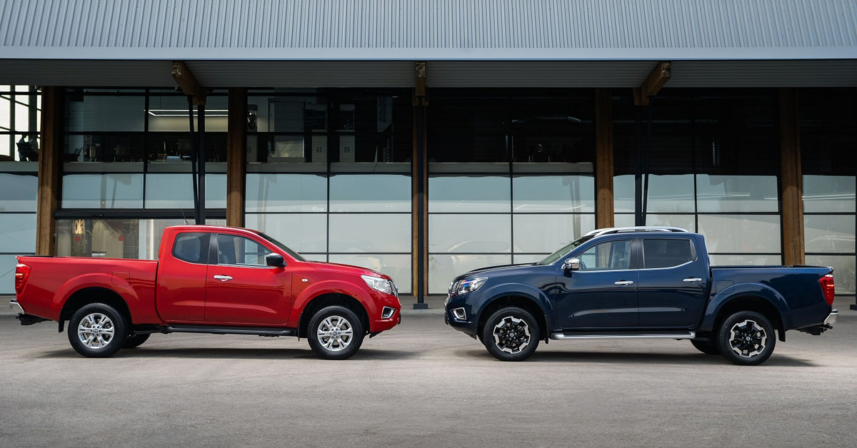 An image of two Nissan Navara trucks facing each other