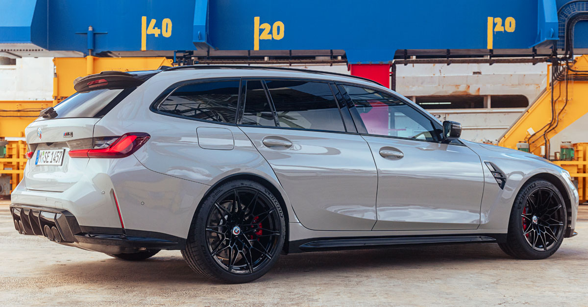 An image of the 2022 BMW M3 Competition Touring xDrive from the side profile