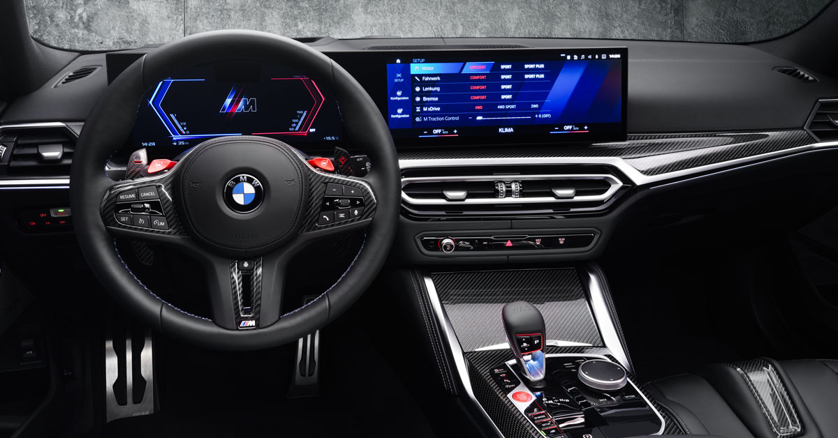 An image of the 2022 BMW M3 Competition Touring xDrive interior front dashboard and steering wheel