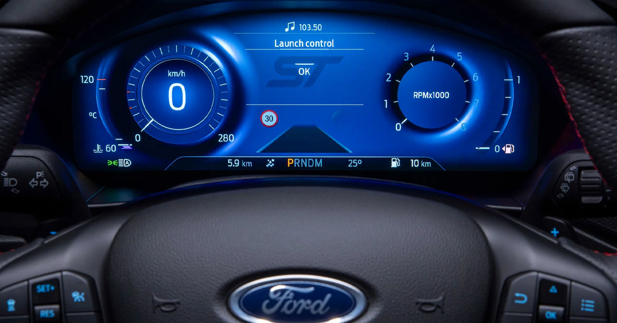 A picture of the digital cockpit of the new 2022 Ford Focus ST in Mean Green paint scheme