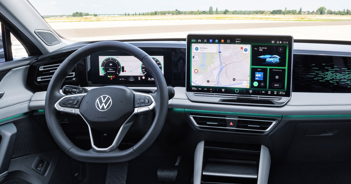 An image showing the front dashboard and steering wheel area of the 2024 Volkswagen Tiguan SUV